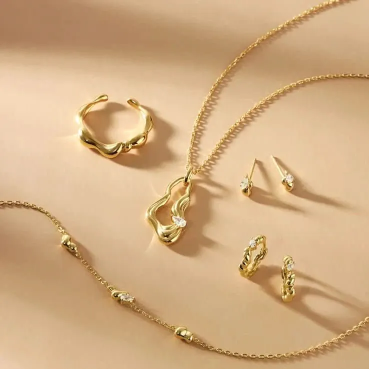 Boucles d'oreilles Huggie à vagues torsadées en or Ania Haie Gold E050-01G Bijoux Ania Haie
