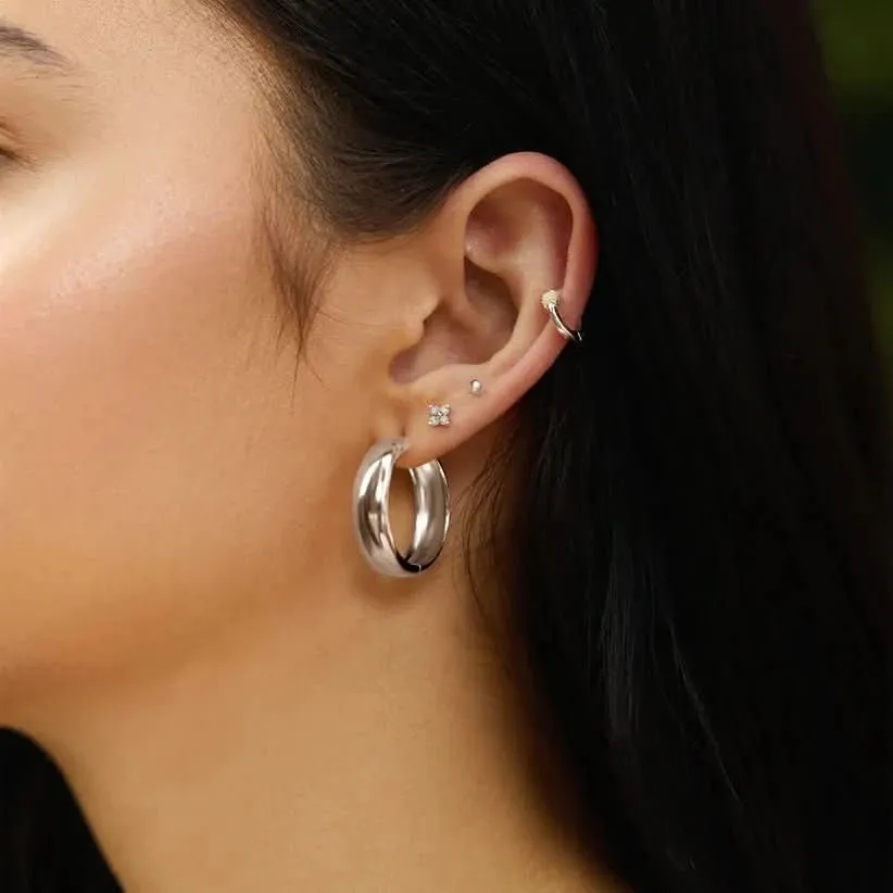 Boucles d'oreilles à clous à quatre pétales en argent E064-01H Ania Haie Jewellery